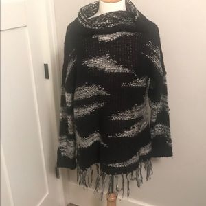 Fringe turtleneck sweater